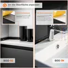 Two side-by-side comparisons of different types of baseboards, one with adhesive tape and the other with adhesive foam, shown in kitchen and bathroom settings. Produktbild-Vorschau