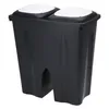 A black dual trash can with white lids, shown against a white background. Anteprima dell’immagine prodotto