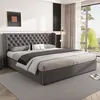 A modern bedroom with a large upholstered bed. Náhled obrázku produktu