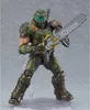 A detailed action figure of the Doom Slayer from Doom Eternal, holding a chainsaw. Náhľad obrázku produktu