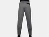 The back view of a pair of grey joggers with a black waistband and cuffs. Produktbild-Vorschau