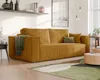 A modern living room with a mustard yellow corduroy sofa, a green throw blanket, and a geometric rug. Náhled obrázku produktu
