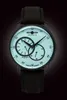 A close-up studio shot of a men's wristwatch against a dark, gradient background. Anteprima dell’immagine prodotto