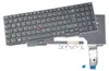 A black laptop keyboard with a red trackpoint, detached from a laptop and lying on a white background. Produktbild-Vorschau