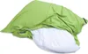 A partially opened green beanbag chair showing the white inner liner. Podgląd zdjęcia produktu