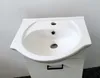 A white ceramic sink is shown mounted on a white cabinet. Podgląd zdjęcia produktu