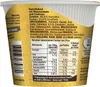 A close-up view of the side of a food product container, showing nutritional information and ingredients. Produktbild-Vorschau