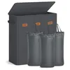 A dark gray laundry hamper with three compartments and three removable laundry bags. Produktbild-Vorschau