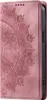 A pink flip case for a Samsung Galaxy S24 Ultra with a mandala pattern. Produktbild-Vorschau
