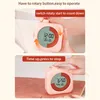 A pink digital timer is shown in two different stages of operation, with hands interacting with it. Náhľad obrázku produktu