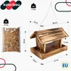 A birdhouse with dimensions and a bag of birdseed are shown, along with weight information. Produktbild-Vorschau
