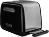 A black and silver KitchenAid toaster with its crumb tray extended. Voir les images du produit