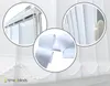 A collage of close-up images showing details of white vertical blinds, including the top mechanism, the fabric texture, and the beaded pull cord. The bottom of the image shows the scalloped edge of the blinds with decorative beads. Voir les images du produit