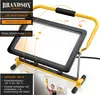 A yellow and black LED work light is shown with diagrams indicating its adjustable angles and a small inset image of a person painting a ceiling. Anteprima dell’immagine prodotto