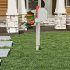 A mailbox filled with mail is shown in front of a house. Produktbild-Vorschau