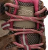A close-up view of the lacing area of a hiking boot. Voir les images du produit