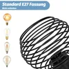 A close-up of a black wire lamp shade with several different types of light bulbs shown on the left side, and text at the top indicating 'Standard E27 Fassung' and 'Nicht enthalten'. Produktbild-Vorschau