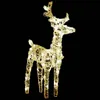 A lit-up reindeer decoration against a black background. Anteprima dell’immagine prodotto