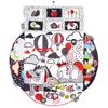 A round, black and white play mat with red accents, featuring various illustrations and sensory elements. Podgląd zdjęcia produktu