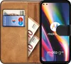 A flip case for a smartphone, showing cards and cash inside. Náhled obrázku produktu