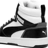 A close-up view of the side of a white and black Puma high-top sneaker. Náhled obrázku produktu