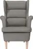 A studio shot of a grey armchair. Náhľad obrázku produktu