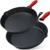 Two cast iron frying pans with red silicone handle covers, stacked on a white background. Anteprima dell’immagine prodotto