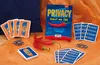 A board game called Privacy - Scharf wie Chili is displayed with game cards, chili peppers, and tokens on an orange fabric surface. Produktbild-Vorschau
