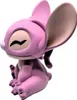 A pink figurine of the character Angel from Lilo & Stitch, sitting down with its eyes closed. Anteprima dell’immagine prodotto