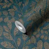 A roll of teal wallpaper with a gold floral pattern is shown. Náhľad obrázku produktu