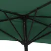 Close-up view of the underside of a green umbrella, showing the metal frame and fabric. Náhľad obrázku produktu