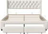 A white upholstered bed frame with a tufted headboard and wooden slats for mattress support. The bed frame has two drawers built into the base. Anteprima dell’immagine prodotto
