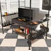 A grill pavilion set up on a patio with a checkered floor. Produktbild-Vorschau