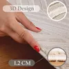 A hand is shown touching a rug, highlighting its texture and thickness. Produktbild-Vorschau