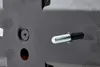 Close-up view of the back of a black plastic automotive part with a silver threaded bolt protruding from it. Anteprima dell’immagine prodotto
