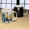 Two Demon Slayer mugs are displayed on a woven mat. Produktbild-Vorschau