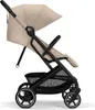 A side view of a beige and black stroller against a white background. Anteprima dell’immagine prodotto