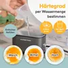 A hand is pouring water into an egg cooker, with illustrations of different egg consistencies and text explaining how to determine the hardness of the eggs. Náhled obrázku produktu