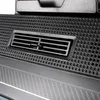 A close-up view of a black vent on a piece of electronic equipment, possibly a computer or exercise machine. Produktbild-Vorschau