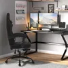A gaming setup with a chair, desk, and monitors. Produktbild-Vorschau
