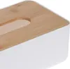 A close-up view of the top and side of a white tissue box with a wooden lid. Produktbild-Vorschau
