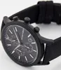 A close-up shot of a black Emporio Armani chronograph watch. Voir les images du produit