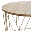 Close-up of a round wooden tabletop with a gold wireframe base. Podgląd zdjęcia produktu