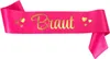 A pink sash with gold text and hearts. Produktbild-Vorschau