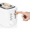 A hand is shown pressing the lever of a white toaster with two slices of bread inside. Anteprima dell’immagine prodotto