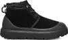 A black UGG motorcycle boot is shown from the side against a white background. Voir les images du produit