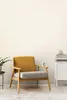 A chair and a small cabinet in a room. Produktbild-Vorschau
