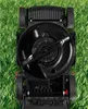 A top-down view of a black electric lawnmower sitting on green grass. Produktbild-Vorschau
