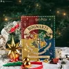 A Harry Potter Hogwarts advent calendar is displayed with Christmas decorations. Produktbild-Vorschau