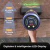 A hand holding a vacuum cleaner with a digital display, demonstrating its use on a floor and carpet. Produktbild-Vorschau